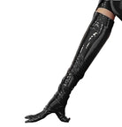 Shiny black faux leather clubwear dress thigh-high boots with pointed toes on wooden floor
