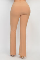 VacationGrabs women's fit and flare casual pants in beige shown from the back with a high waist design