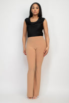 VacationGrabs women's beige fit and flare casual pants paired with a black sleeveless top