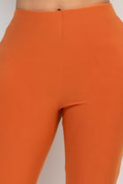 Orange fit and flare casual pants for women from VacationGrabs with a smooth high waist design