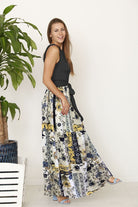 EG fashion floral patchwork summer plus size maxi dress worn by smiling woman with long hair