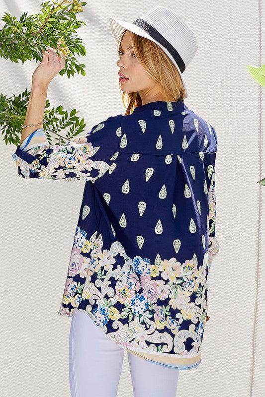 Shopin LA floral roll up sleeve top in navy with colorful floral patterns for a stylish summer look