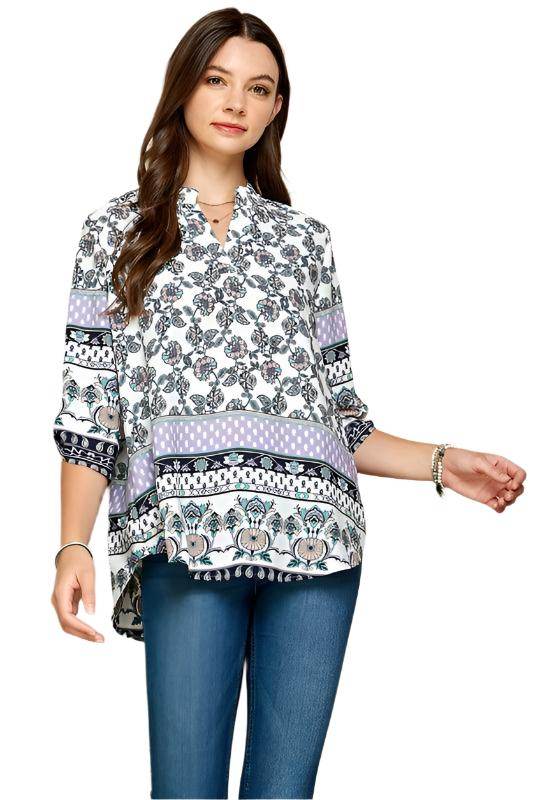 Shopin LA women's floral roll up sleeve top in white with colorful patterned accents