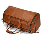 VacationGrabs foldable leather suit bag in brown with sturdy handles and zip closure for travel