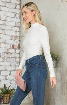 Andante USA form-fitting travel bodysuit in white designed for stylish comfort and travel versatility