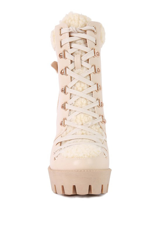 Rag Company fur lined heeled boots with lace-up front and sturdy sole for stylish winter wear