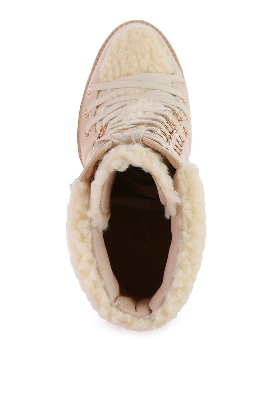 Top view of Rag Company fur lined heeled boots with soft interior for warmth and style