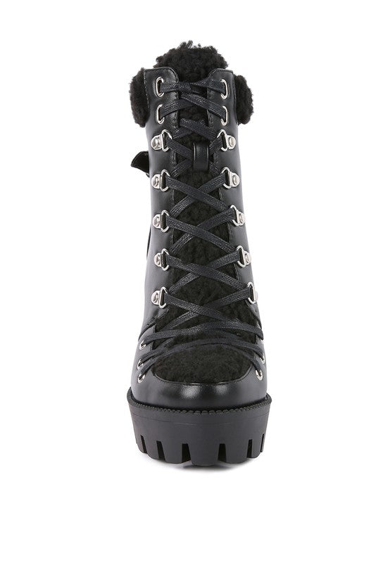 Rag Company fur lined heeled boots with a stylish lace-up design and rubber sole for comfort and support