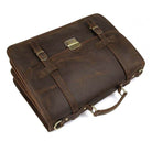 Classic brown genuine leather business bag with sturdy handle and buckles for professional use