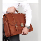Genuine leather business bag in brown with a classic design and sturdy handle for professionals