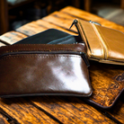 Genuine leather coin wallet in brown and gold colors, stylish and compact for everyday use