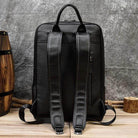 Genuine leather laptop backpack with padded straps and sleek design for everyday use