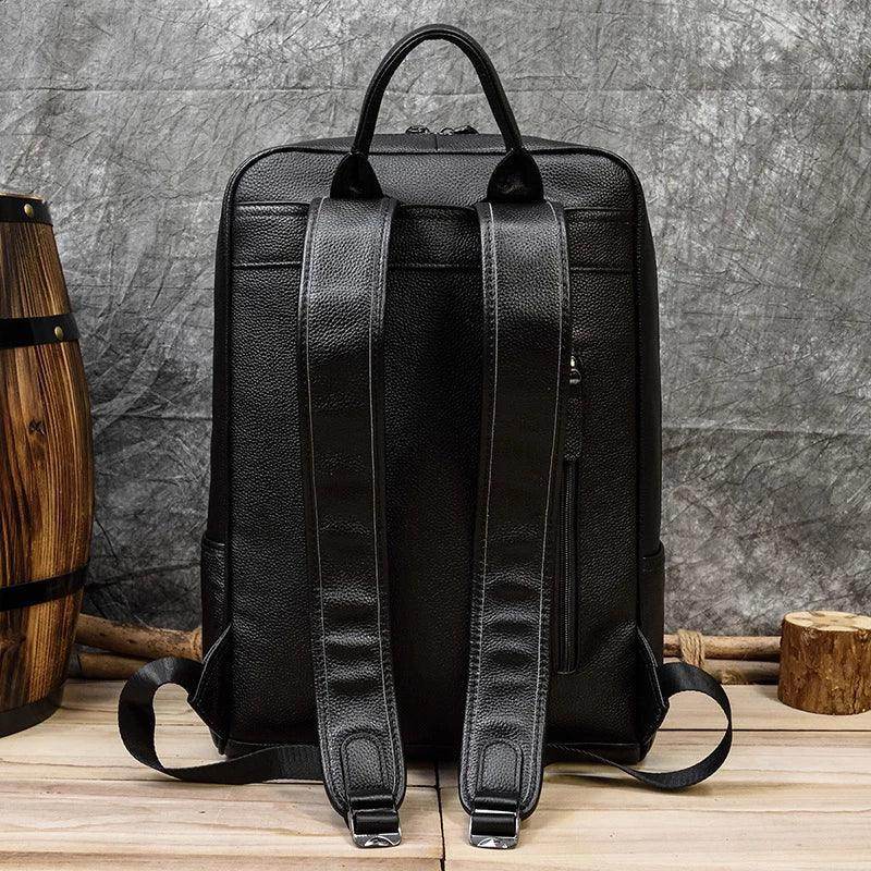 Genuine leather laptop backpack with padded straps and sleek design for everyday use