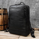 Genuine leather laptop backpack in black with a sleek design for professional use