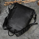 Genuine leather laptop backpack in black with adjustable straps and sleek design