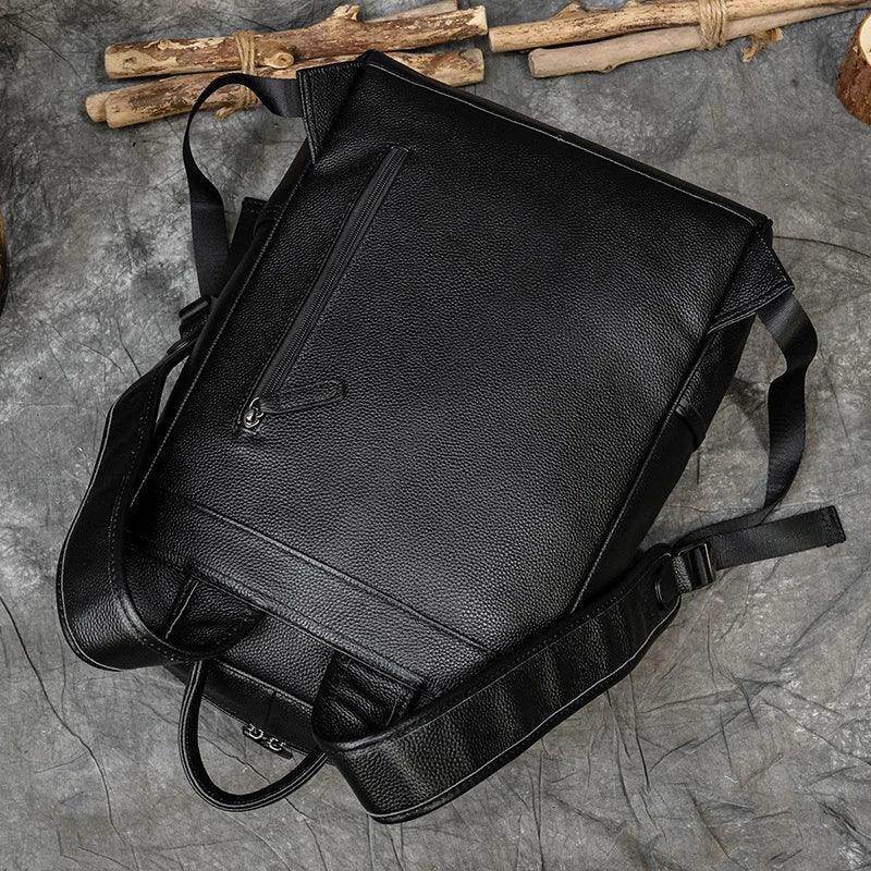Genuine leather laptop backpack in black with adjustable straps and sleek design