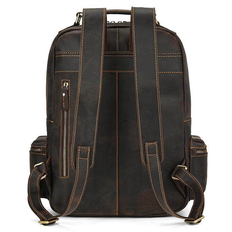 Genuine leather laptop backpack with comfortable padded straps and multiple compartments for organization