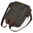 Genuine leather laptop backpack in dark brown with adjustable straps and exterior zipper pocket