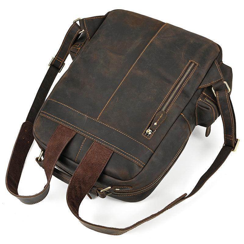 Genuine leather laptop backpack in dark brown with adjustable straps and exterior zipper pocket
