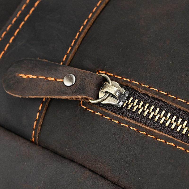 Close-up of a genuine leather laptop backpack zipper detail showcasing quality craftsmanship and stitching