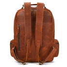 Genuine leather laptop backpack in brown with padded straps and multiple pockets for convenience