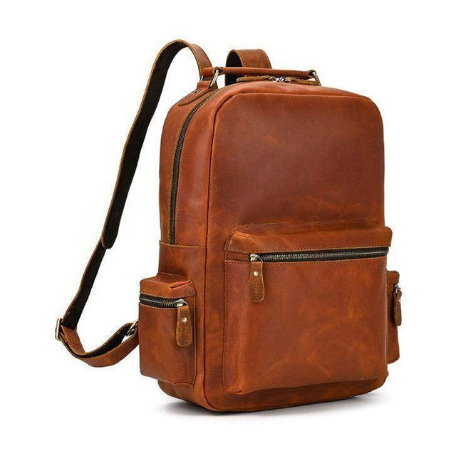 VacationGrabs genuine leather laptop backpack in brown with multiple pockets and adjustable straps