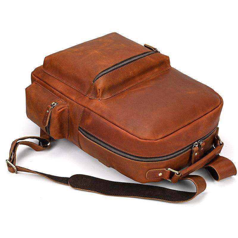 Genuine leather laptop backpack from VacationGrabs with adjustable straps and multiple compartments