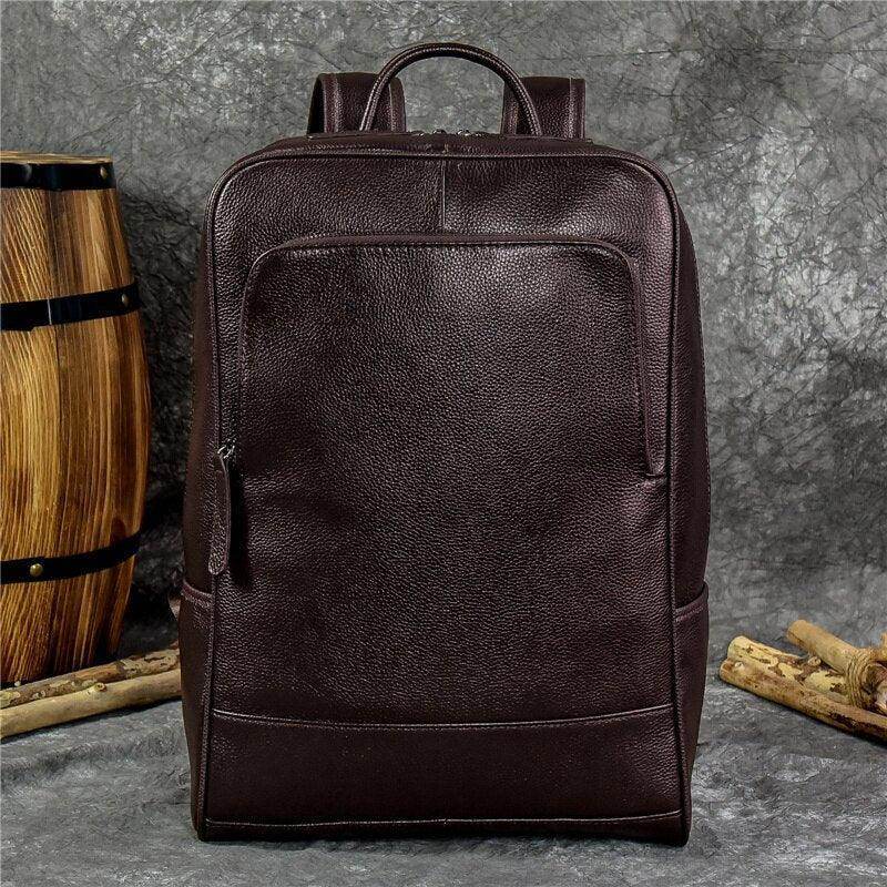 Genuine leather mens daypack in dark brown with a sleek design for everyday use