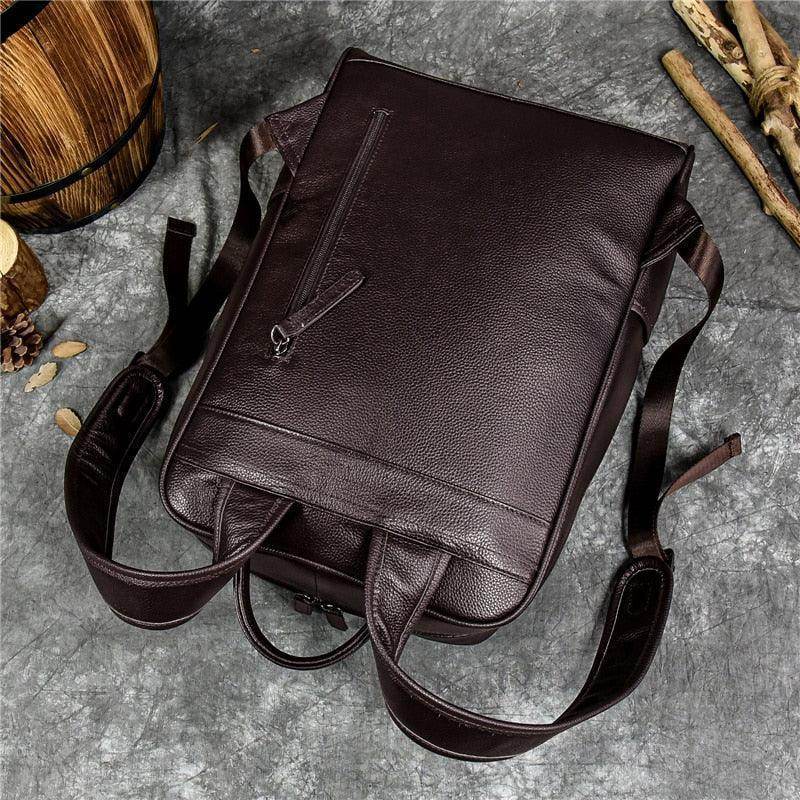 Genuine leather mens daypack with adjustable straps, perfect for daily use and travel