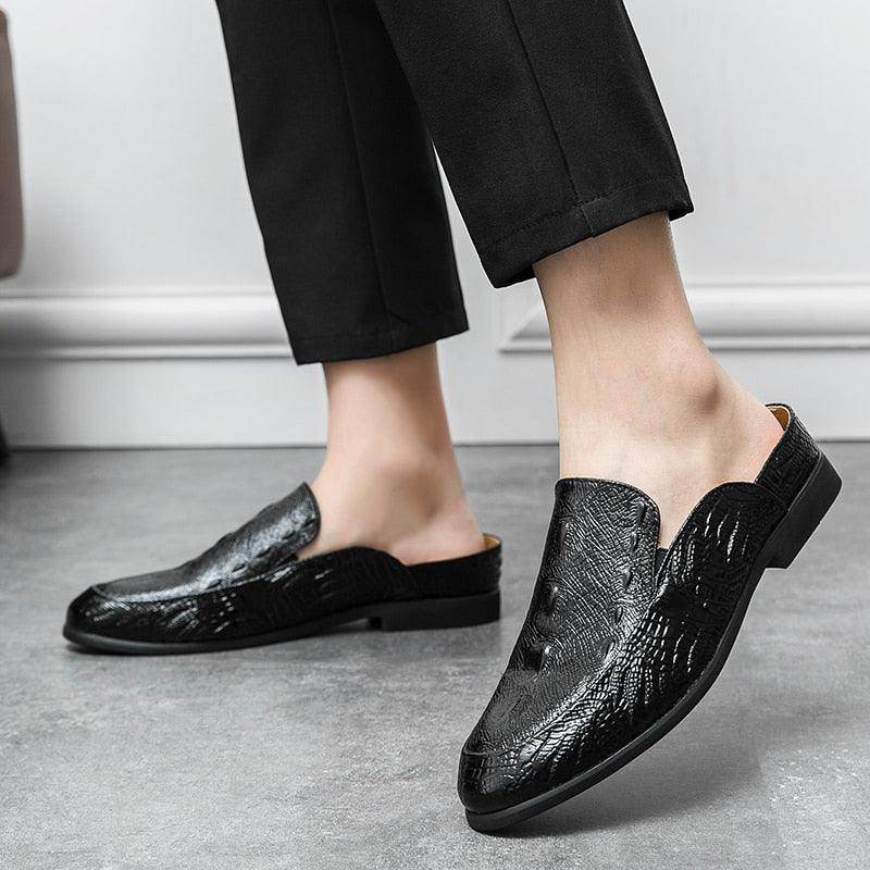 Genuine slip-on loafers in black with a stylish design for men's casual footwear