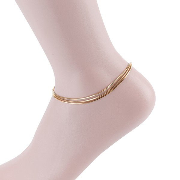 Elegant gold anklet for women displayed on ankle with minimalist design by Bella Chic