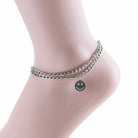 Bella Chic gold anklet with smiley charm featuring a double chain design on ankle