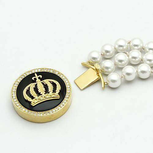 Elegant gold brass bracelet for women featuring a crown design and pearl accents