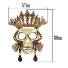 Gold skull brooch for women with a crown design featuring sparkling accents and detailed craftsmanship