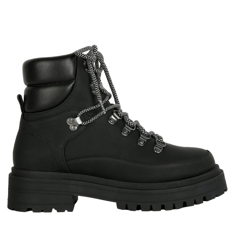 Black boot with chain details on a white background