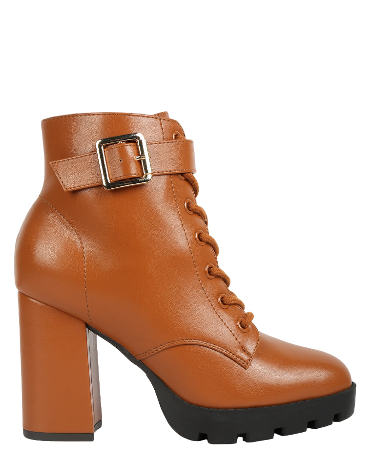 Brown leather boot with a block heel and buckle on a white background