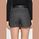 Back view of Miley + Molly grey mini wrap skirt with stylish black belt for a chic look