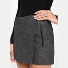 Miley + Molly grey mini wrap skirt featuring a stylish side zipper for a chic look