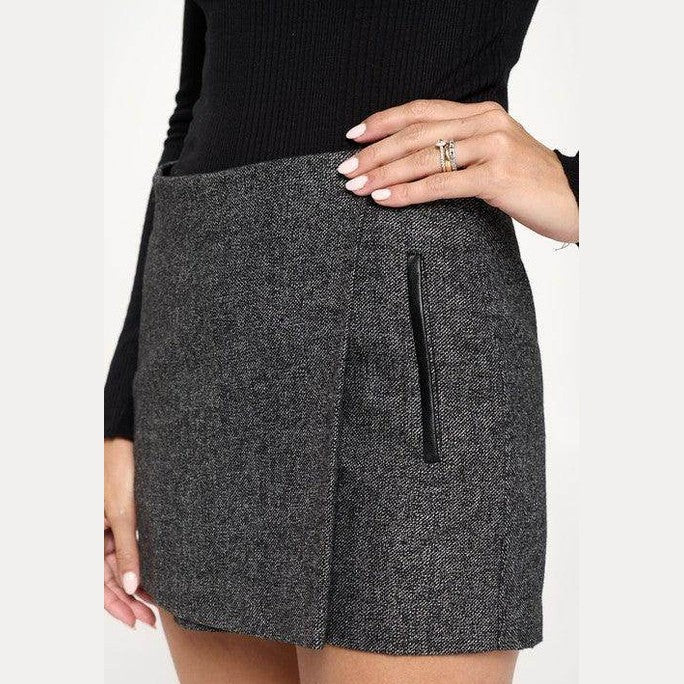 Miley + Molly grey mini wrap skirt featuring a stylish side zipper for a chic look