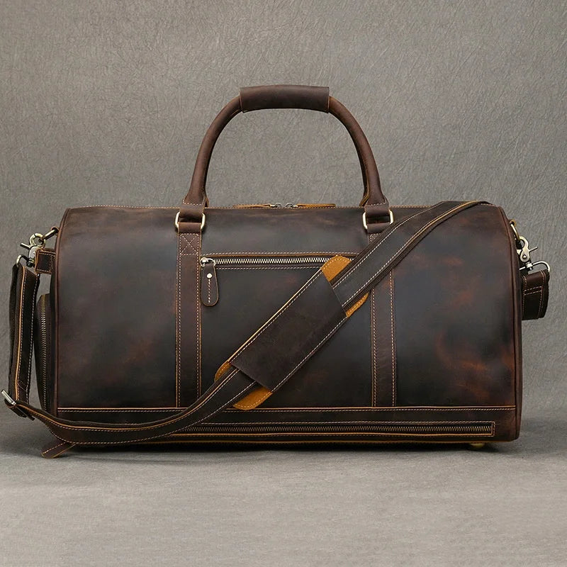 Men's brown leather gym bag with adjustable shoulder strap
