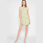 Emory Park halter neck floral mini dress in light green with a vibrant floral pattern for a fresh summer look