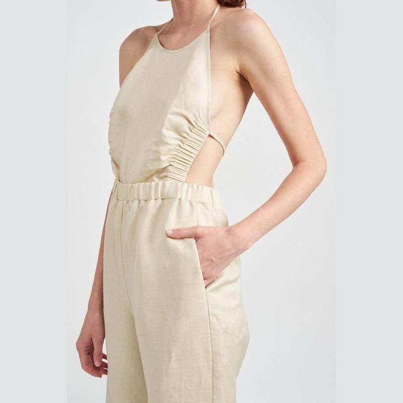Emory Park halter neck jumpsuit open back in beige with side ruching and pockets for a stylish look
