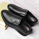 Black handmade casual slide on shoes with perforated design for breathable comfort