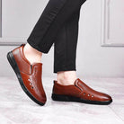 Handmade casual slide on shoes for men in brown with breathable perforations and a comfortable fit