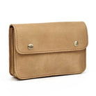 VacationGrabs hands-free belt pouch in tan leather with a snap closure and slim design