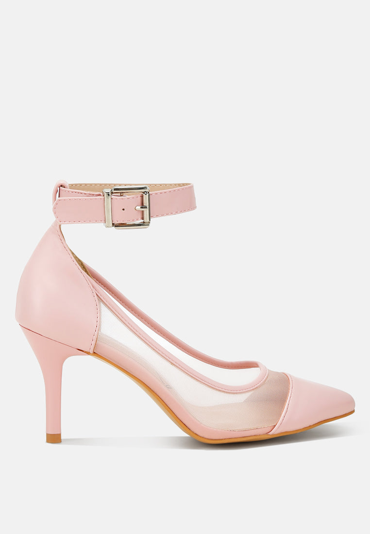 Pink high-heeled shoe with a clear toe on a white background