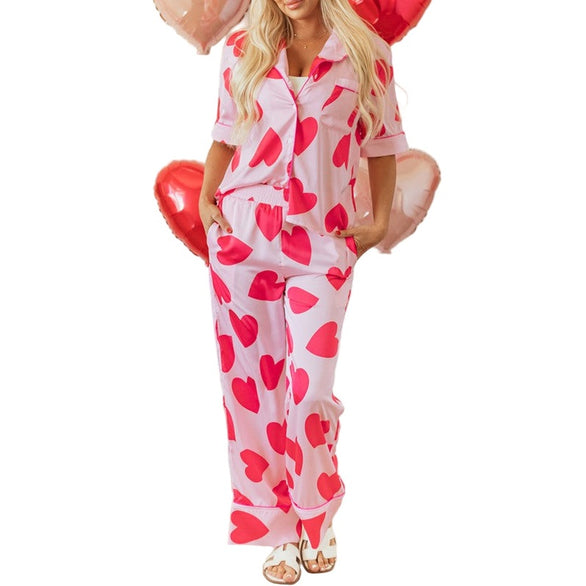 YNIQUE heart print valentine pajamas set in pink with red hearts and button-up top
