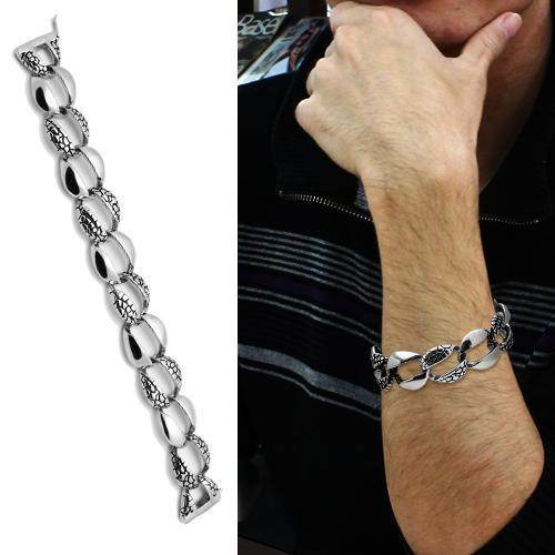 High polished men's bracelet with a sleek design showcased on a model's arm