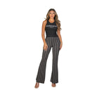 VacationGrabs high waist bell bottoms for women in black and white pattern styled with a black sleeveless top