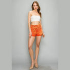 LITZ LA high waist belted shorts in vibrant orange, styled for a trendy summer look